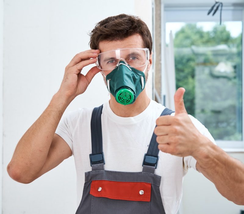 portrait-of-home-repair-worker-renovation-handyman-with-protective-glasses-and-respirator.jpg